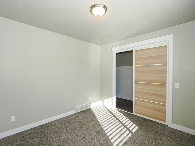 Building Photo - 4-bedroom, 2.5 bathroom Home