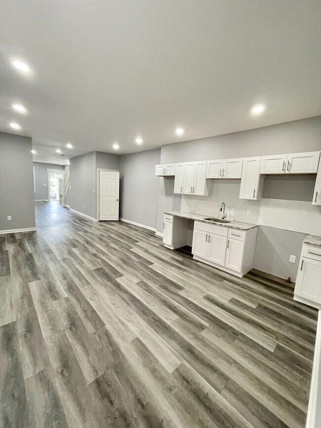 Building Photo - Move-In Ready 4BR Home with Bright Interiors & Ample Storage