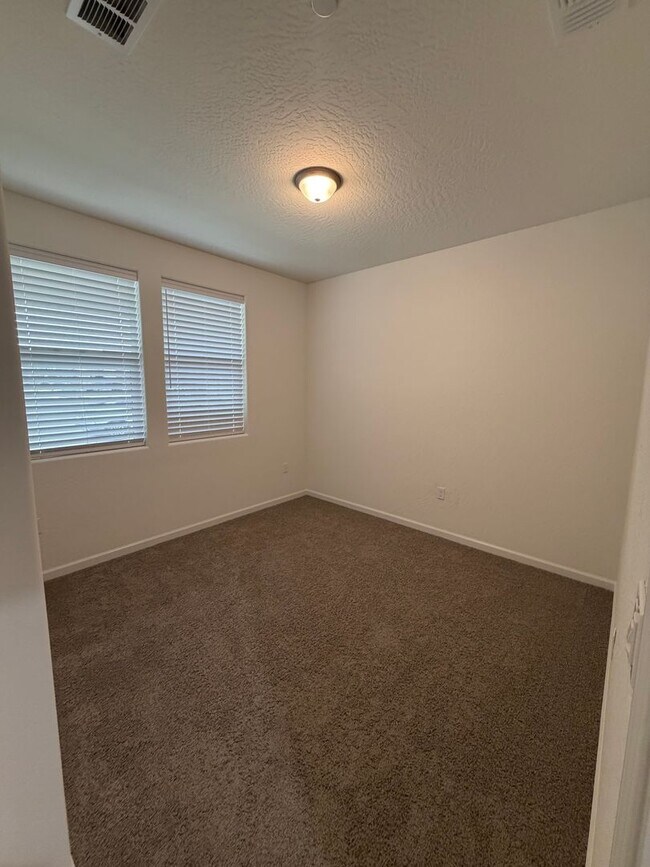 Building Photo - Spacious Brand New 4-Bedroom, 3-Bathroom Home with Solar & Low-Maintenance Yard