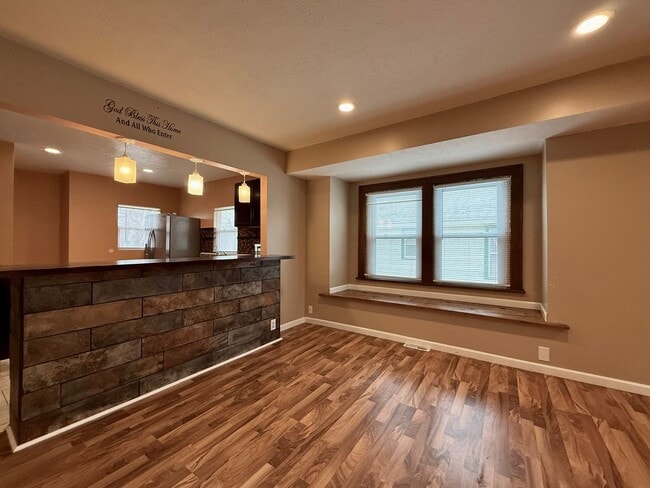 Building Photo - Bright West End Home with Enclosed Porch, Fenced Yard & Garage