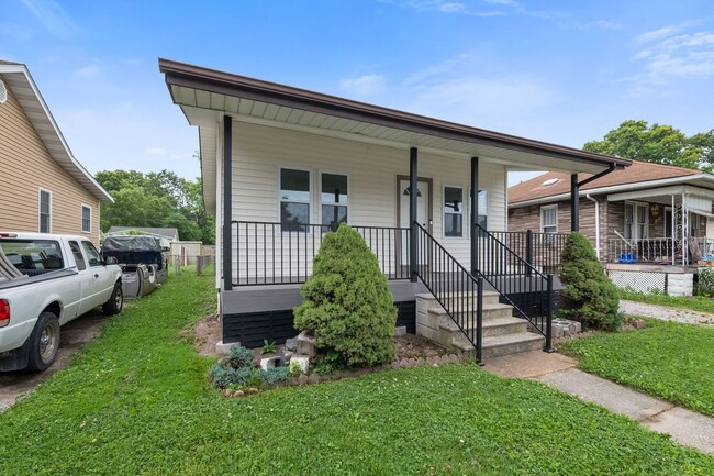 Primary Photo - Porch-Side Charm: Turnkey 2-Bed Home with ...
