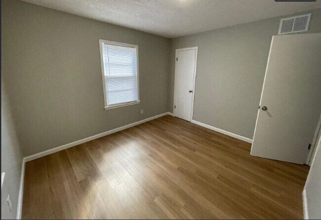 Building Photo - Welcome to Your Next Home with Harvest Investments!