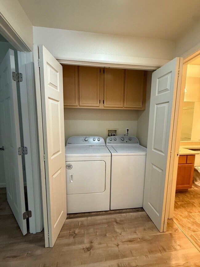 Building Photo - 2 bed | 2bath | 1039 SF | Private Garage & Assigned Parking | Downstairs unit |Owners pays for WS&G!