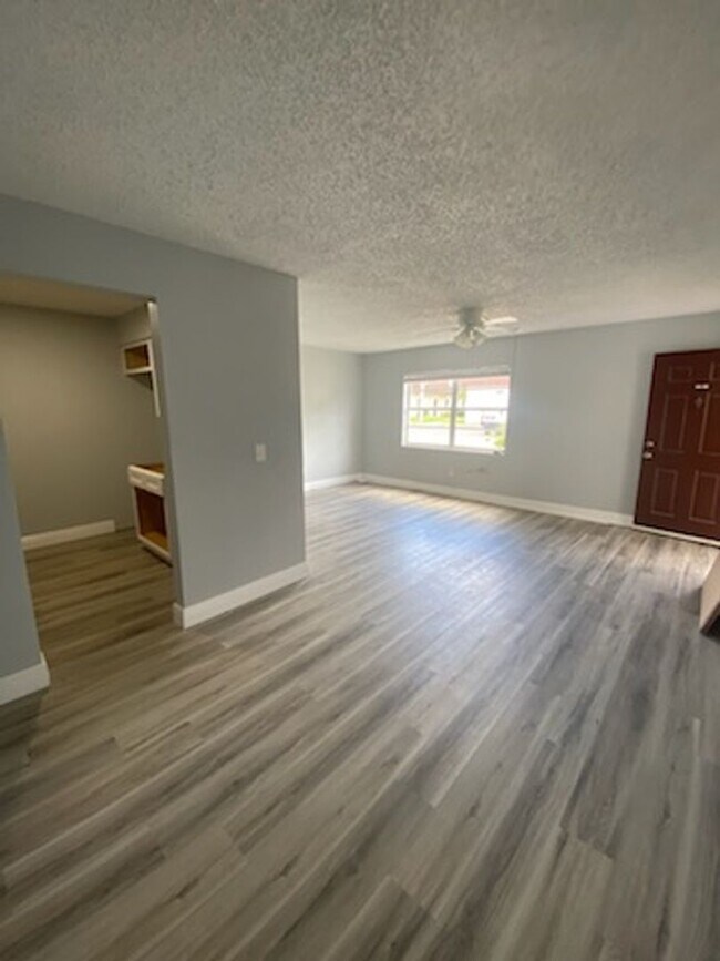 Building Photo - Beautiful water view ground floor condo in...