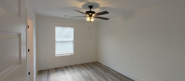 Building Photo - 5-bedroom home with 3 car garage and fully...