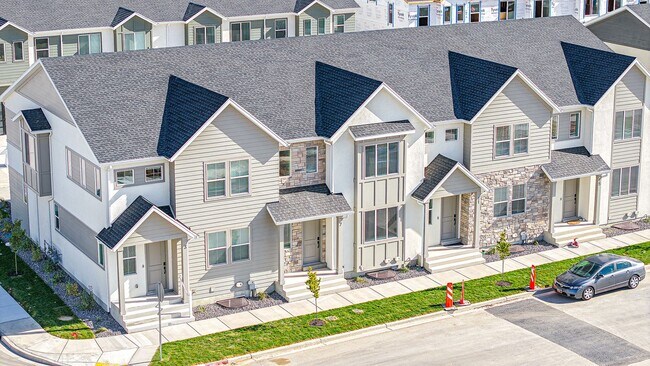 Building Photo - *No Security Deposit Required Upfront for 6 Months!  2024 Townhome. Move In Special!