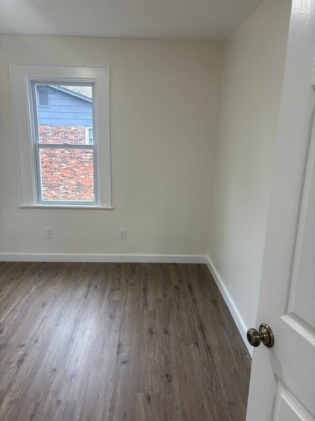 Building Photo - Newly remodeled house available now!