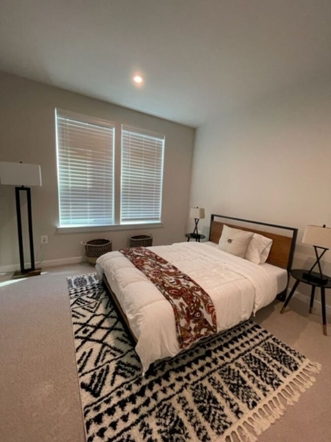 Building Photo - Modern 3BR Condo: Walk to Metro, 3 Miles f...