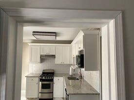 Full kitchen with stove, dishwasher, microwave and Fridge - The Residence at 1743 N Decatur