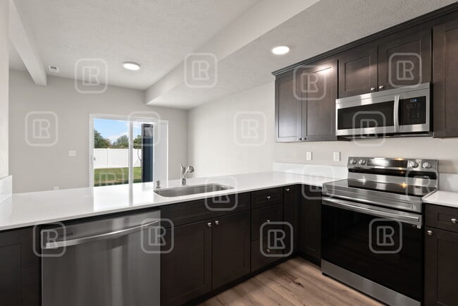 Building Photo - 14321 E 13th Ave