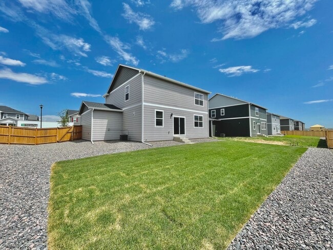 Building Photo - Spacious 4-Bedroom Wellington Home with 3-Car Garage, Loft & Fenced Backyard!