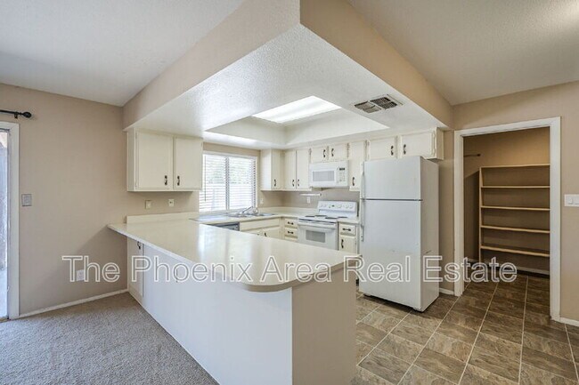Building Photo - 1556 W Peralta Ave