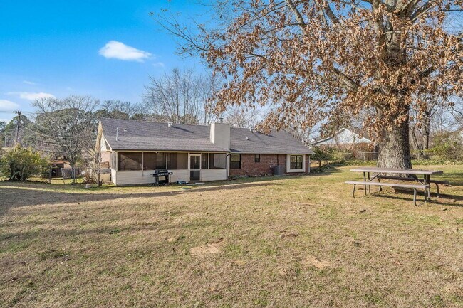 Building Photo - East Fayetteville 3-Bedroom Home with Granite Touches & Cozy Fireplace!"