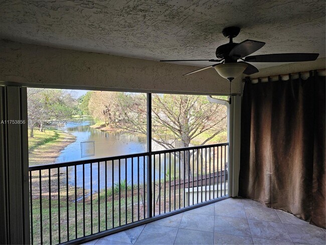 Building Photo - 3299 Cocoplum Cir