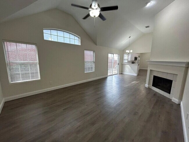 Building Photo - Charming 3-Bedroom Plano Retreat with Cozy Fireplace & Gleaming Hardwood Floors!