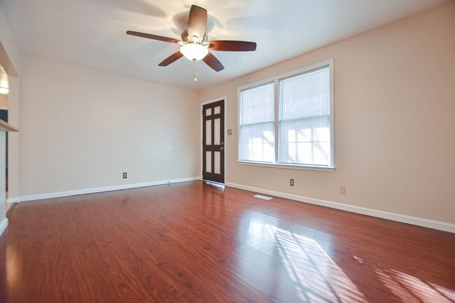 Building Photo - Three Bedroom with Fenced Yard!