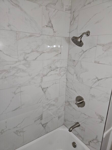 Marble shower - 131 E Park Ave
