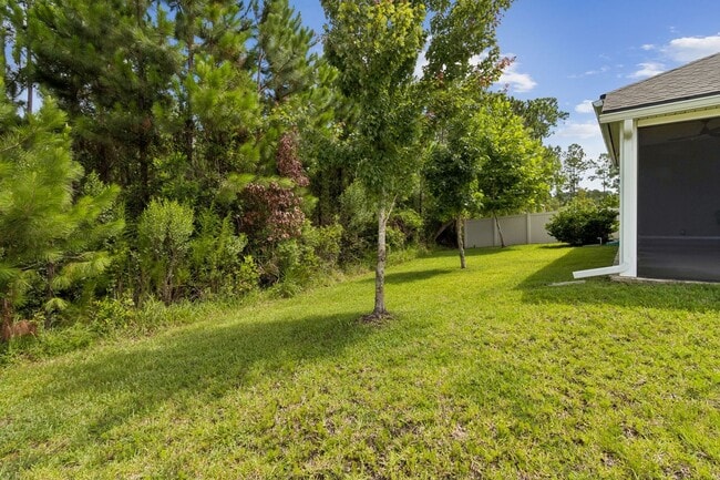 Building Photo - Modern 4BR Home with 3 Full Baths in River Glen | Screened Porch & Resort-Style Amenities