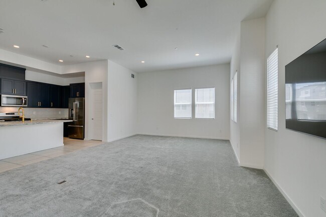 Building Photo - Stunning 4-Level Townhome in Inspirada | R...