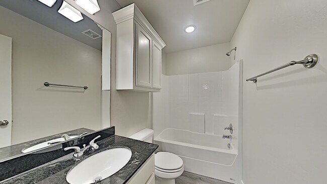 Building Photo - 3 Bedroom 2 Bath Duplex With 2 Car Garage Located Close to the Broadway Extension and 8 minutes f...