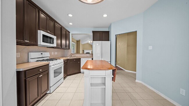 Building Photo - Move-In Ready Montgomery Home with Fenced Yard & Mature Trees!