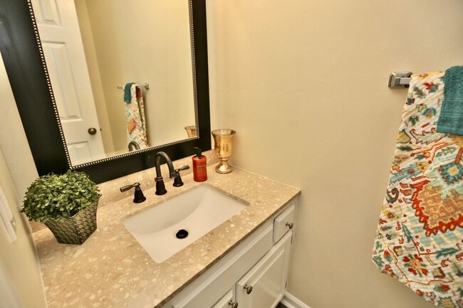 Building Photo - Updated End-Unit Brick Townhome Ready NOW!...