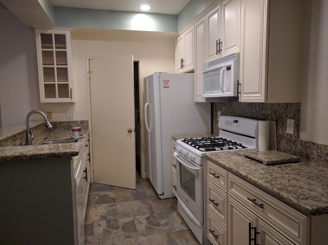 Kitchen with pantry door - 10021 Tabor St