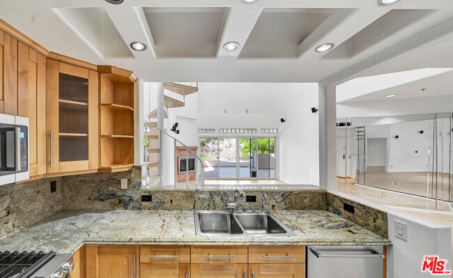 Building Photo - 4477 Woodman Ave