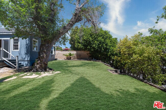 Building Photo - 5572 Bradna Dr