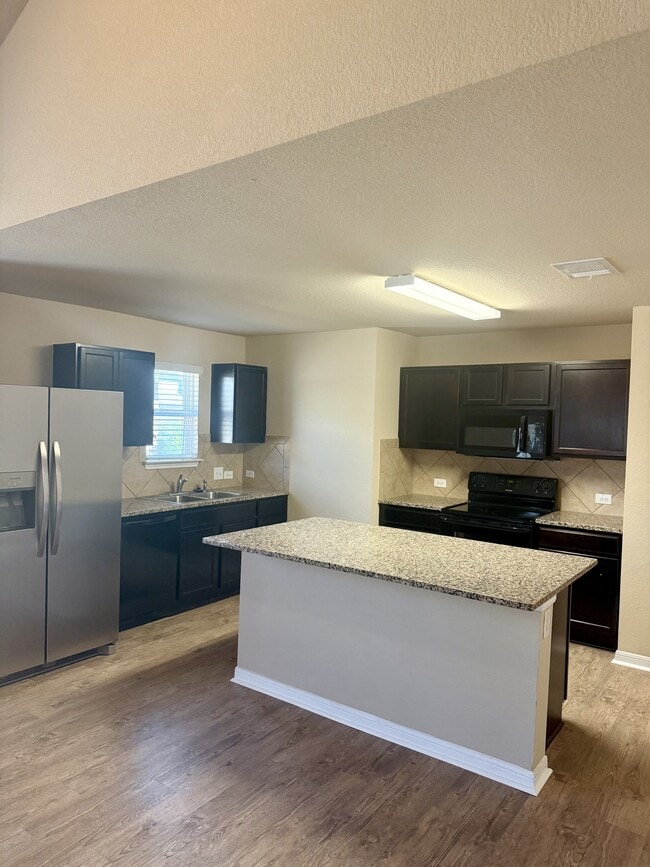 Building Photo - 5704 Montrelia Dr