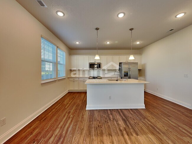 Building Photo - 8331 Merlin Dr