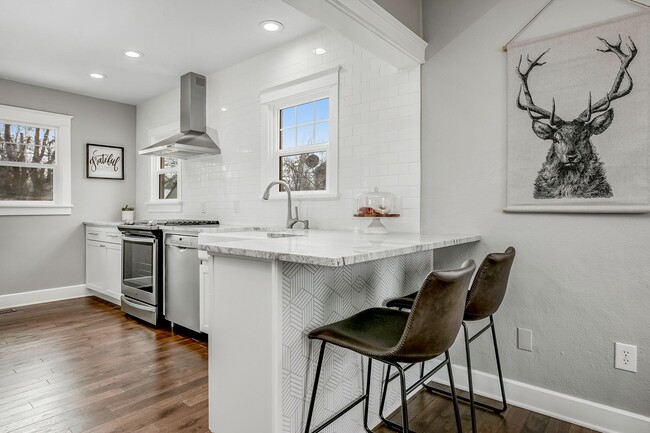 Building Photo - North End Beauty with Bonus Space & Garage!