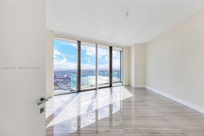 Building Photo - 18975 Collins Ave