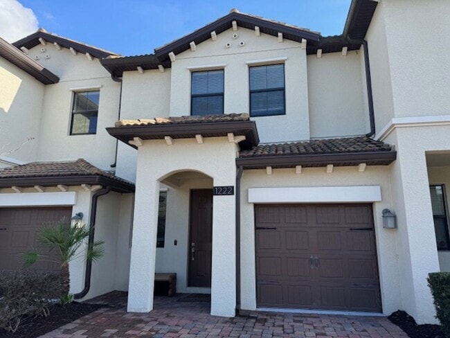 Building Photo - For Rent in ChampionsGate 3/2.5 Townhouse with Water View