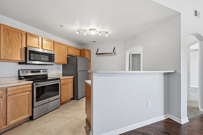 Building Photo - $1,595.95, 1 Bed, 1 Bath Condo in Aurora with In Unit Laundry and Pool Access!