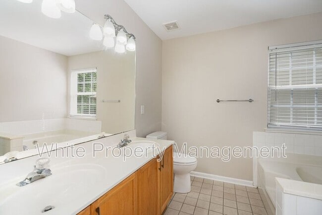 Building Photo - 6305 Trevor Simpson Dr