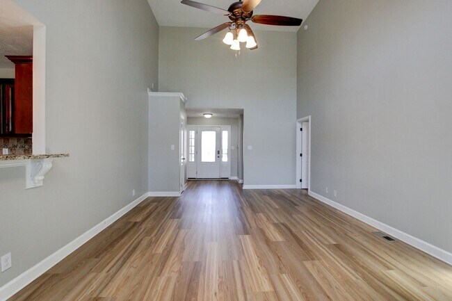 Building Photo - Fantastic Open Floor Plan Home With Stone Front Fireplace, Stainless Steel Appliances, And Close ...