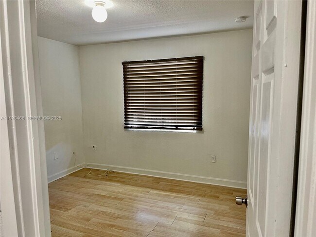 Building Photo - 5857 NW 13th Ave