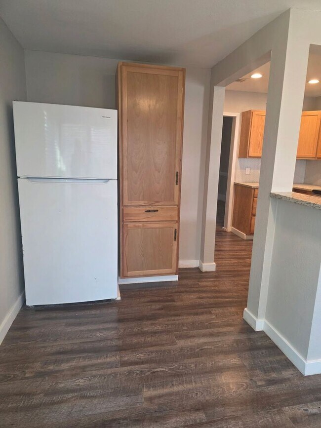 Building Photo - Step into this updated 4-bedroom, 2-bath home ideally situated in the heart of Sand Springs.