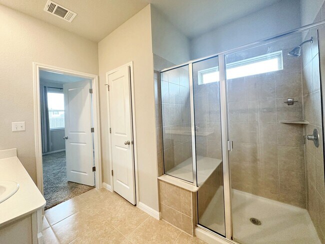 Building Photo - Bright & Roomy 5 Bedroom, 2.5 Bathroom Home with 2-Car Garage