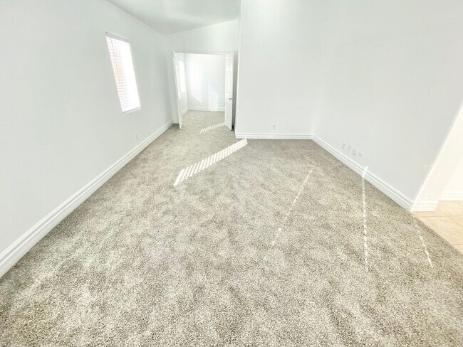 Building Photo - STUNNING 2 STORY HOME IN A GUARD GATED COM...