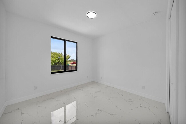 Building Photo - Brand-New Pool Home for Rent – Port Charlo...