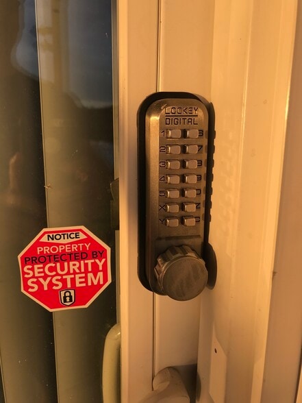 Your private secured entrance - 10683 Linden Dr NW