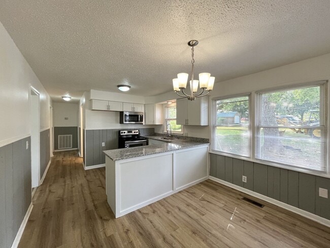 Building Photo - Fully Remodeled Brick Home W/ BIg Yard