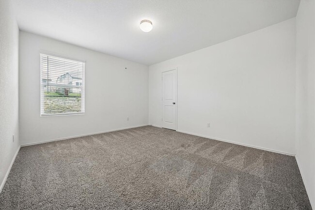 Building Photo - 8008 Purple Aster Pass