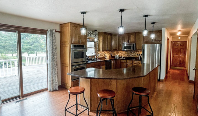 Kitchen - stocked with dinnerware and cooking necessities - 4205 Hunters Glen Dr