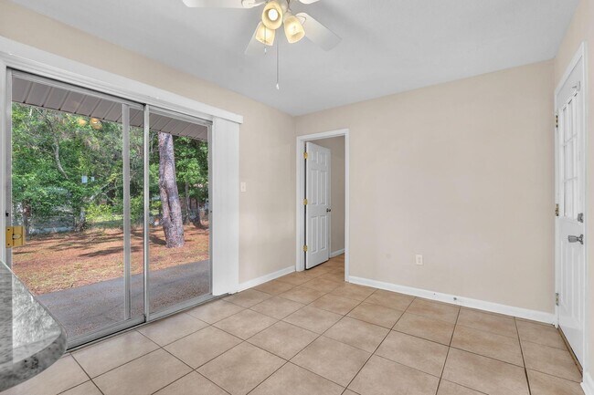 Building Photo - Updated Kitchen and Oversized Yard!