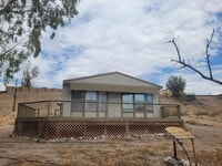 Building Photo - Renovated 3-Bedroom Oasis Near Colorado River with Stunning Desert Views