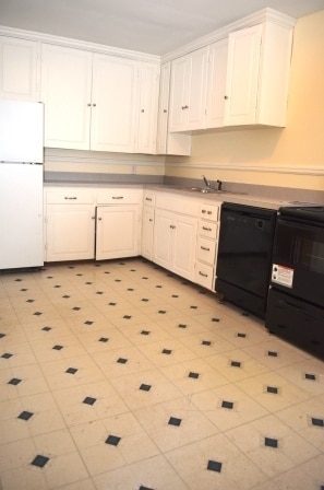 Building Photo - 3 BR/ 1 BA Lakeside Three bedroom with large fenced yard and detached garage/workshop