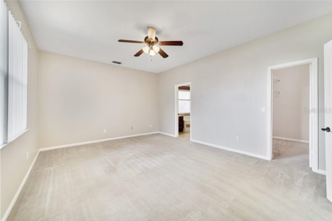 Building Photo - Stunning 5/2.5 Spacious Home with a 3 Car ...